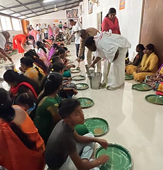 Sai Mahaprasadam served with devotion at the Ashram