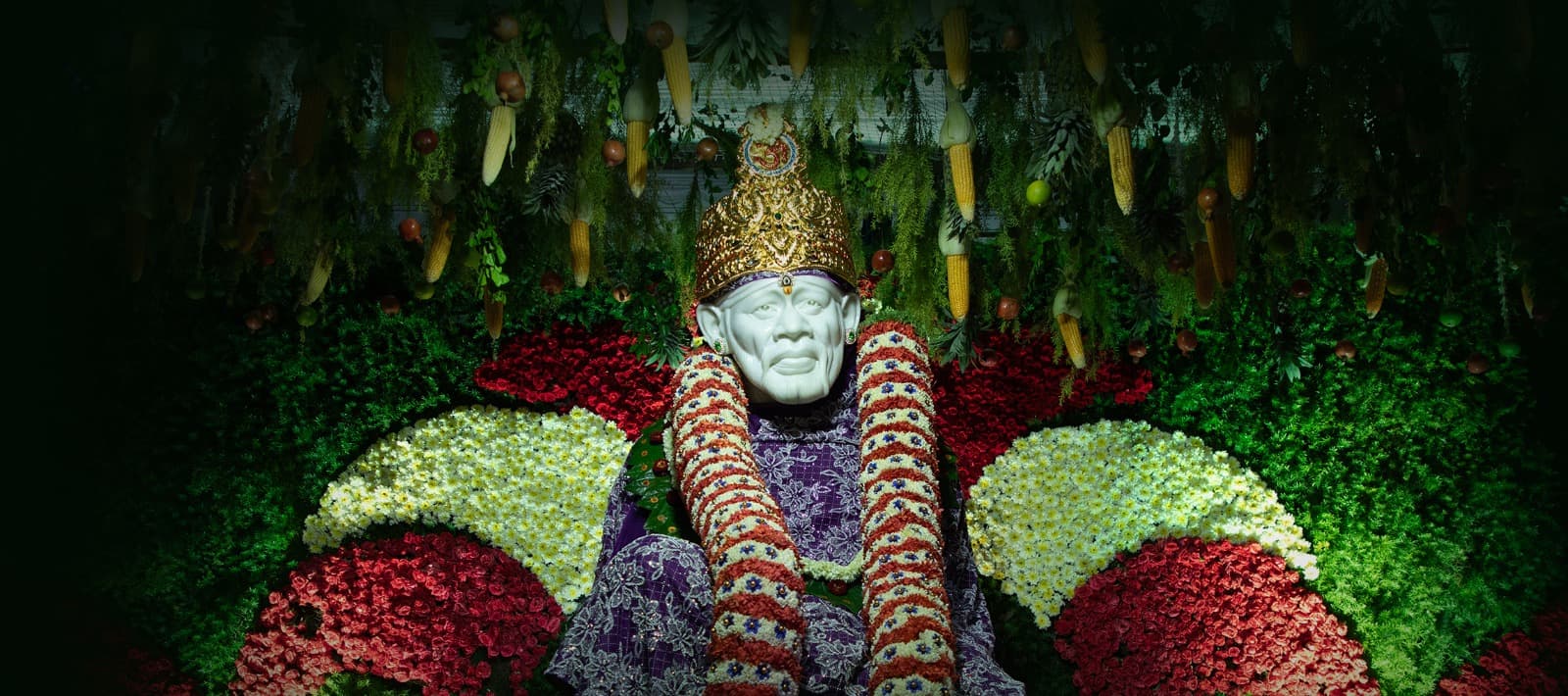 Shirdi Sai Baba adorned for Guru Purnima Mahotsav at Sai Samsthana